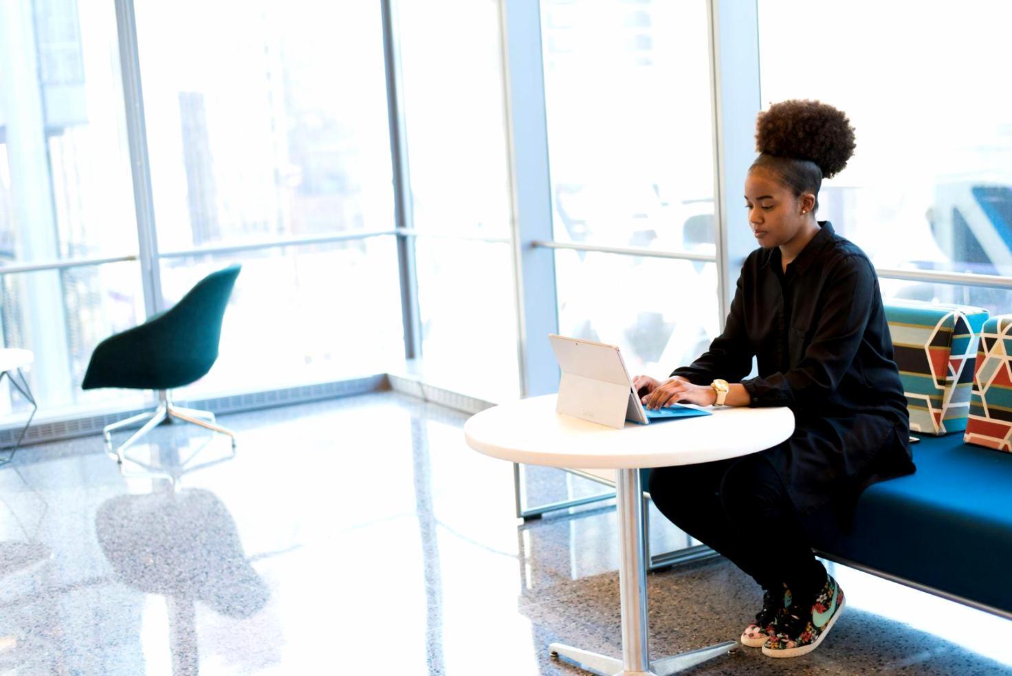 Person reviewing financial documents with realistic approach